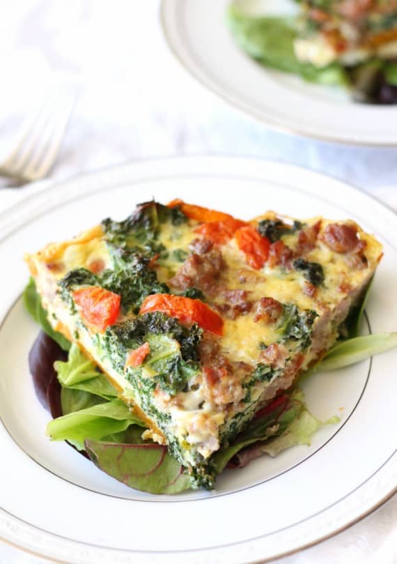 Butternut crusted quiche with sausage kale and tomatoes