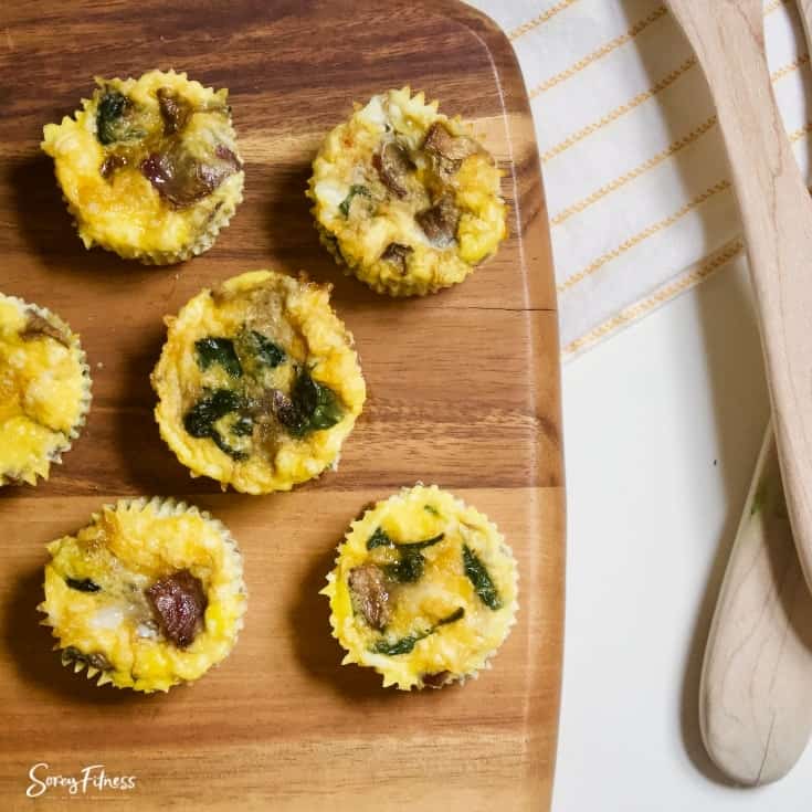 bacon egg cups on a cutting board