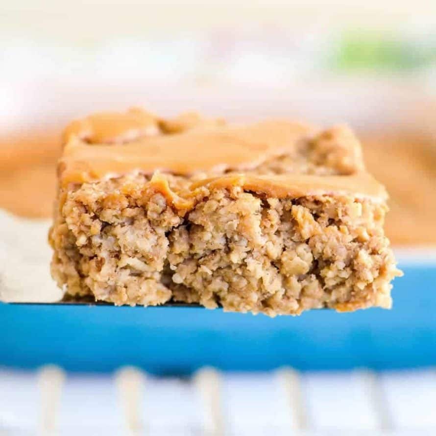 peanut butter banana baked oatmeal square on a blue napkin