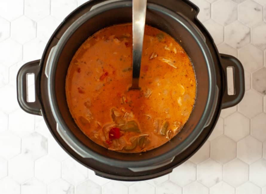 overhead photo of soup in a pressure cooker