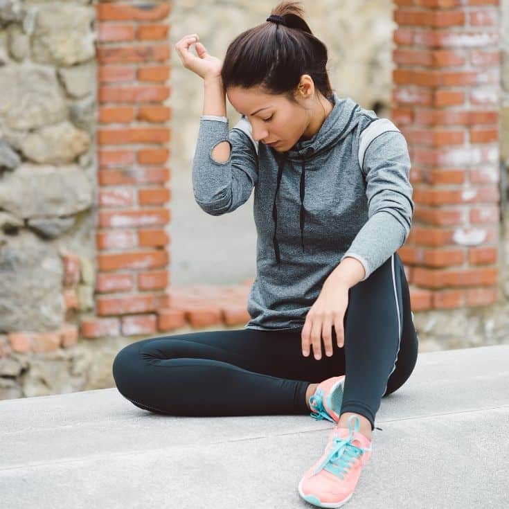 frustrated woman in activewear