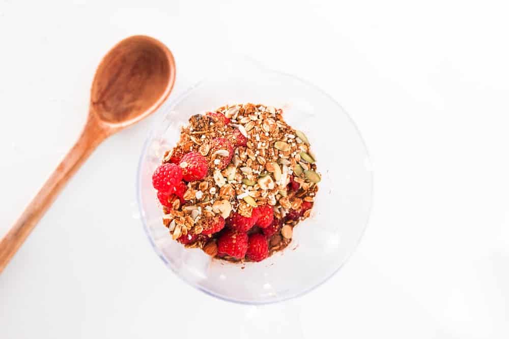 granola and raspberry toppings