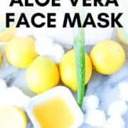 at home DIY aloe vera face mask next to lemons and cotton balls