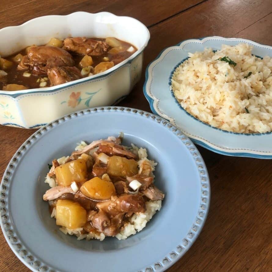 3 bowls - one with rice, one with Hawaiian chicken in sauce and one bowl with a combination of both