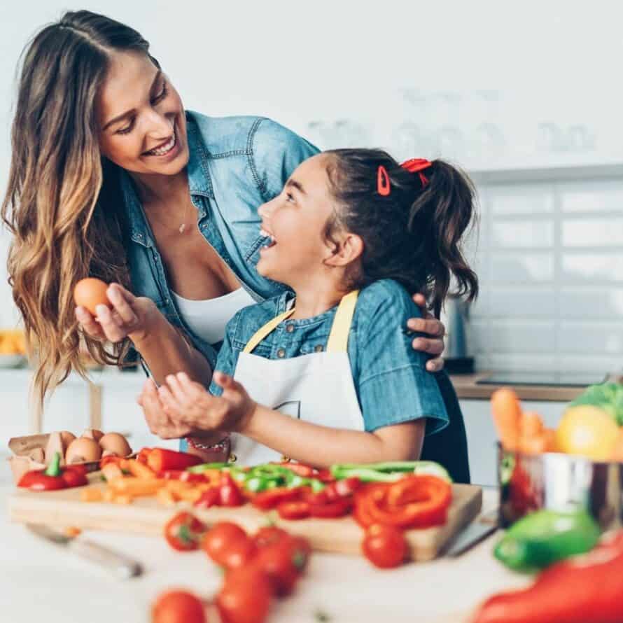 Mother and daughter meal prepping