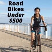 woman cycling with the text overlay 9 Best Women's Road Bikes Under $500