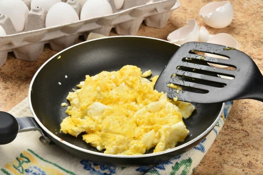 skillet of scrambled eggs