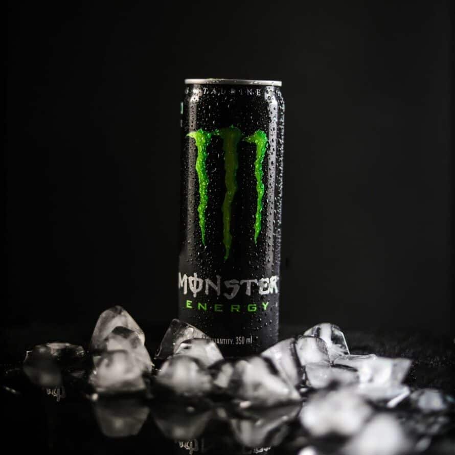 monster energy drink with a black background