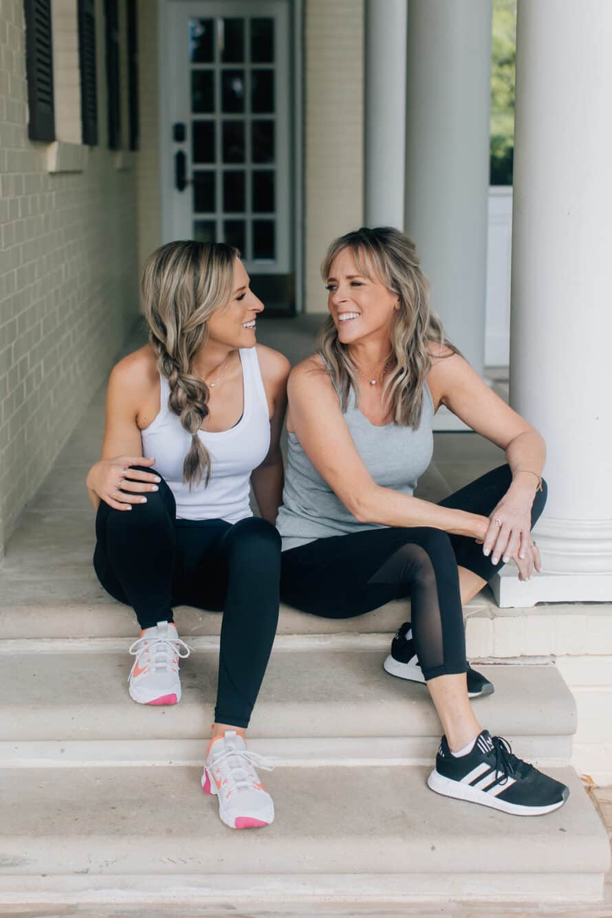 kim and kalee on the front porch in activewear
