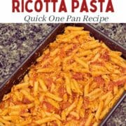 the final pumpkin ricotta pasta in a 9x13 pan - text overlay says delicious and easy to make creamy pumpkin ricotta pasta quick one pan recipe