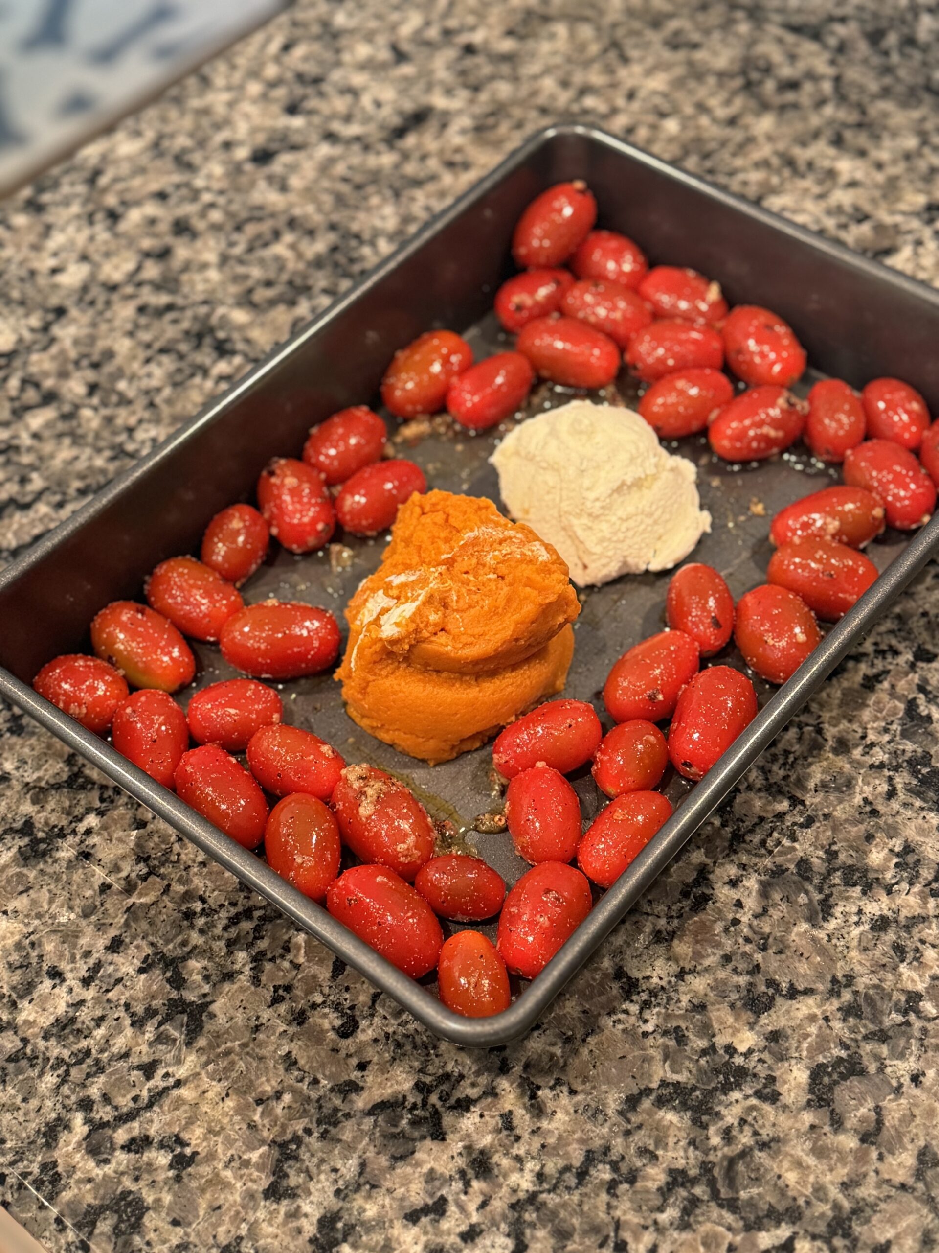 pumpkin ricotta and tomatoes in the 9x13 pan