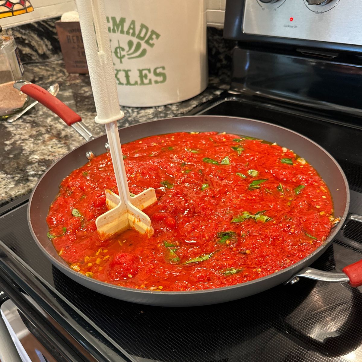 making the sauce in the skillet