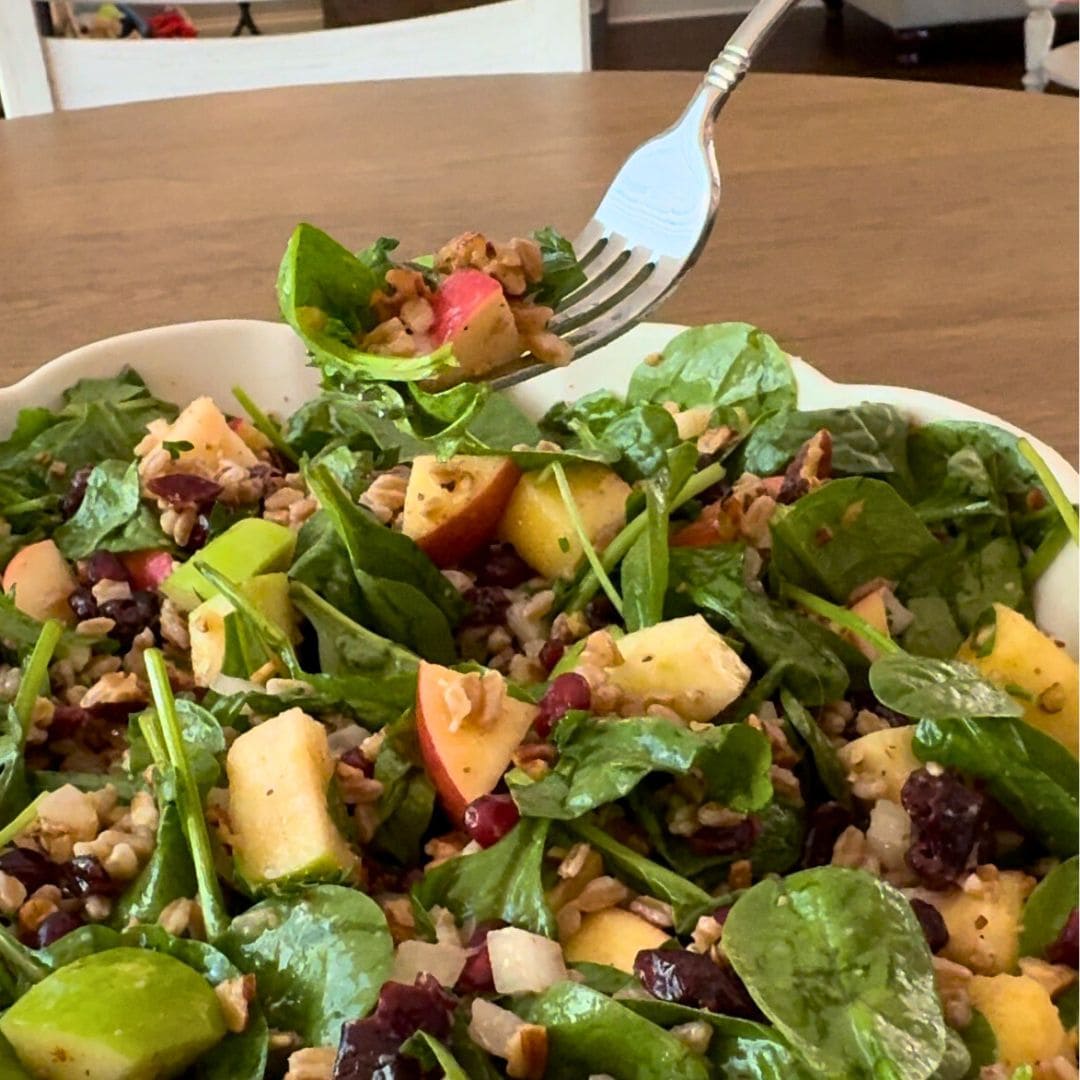 fork of the salad with farro and spinach