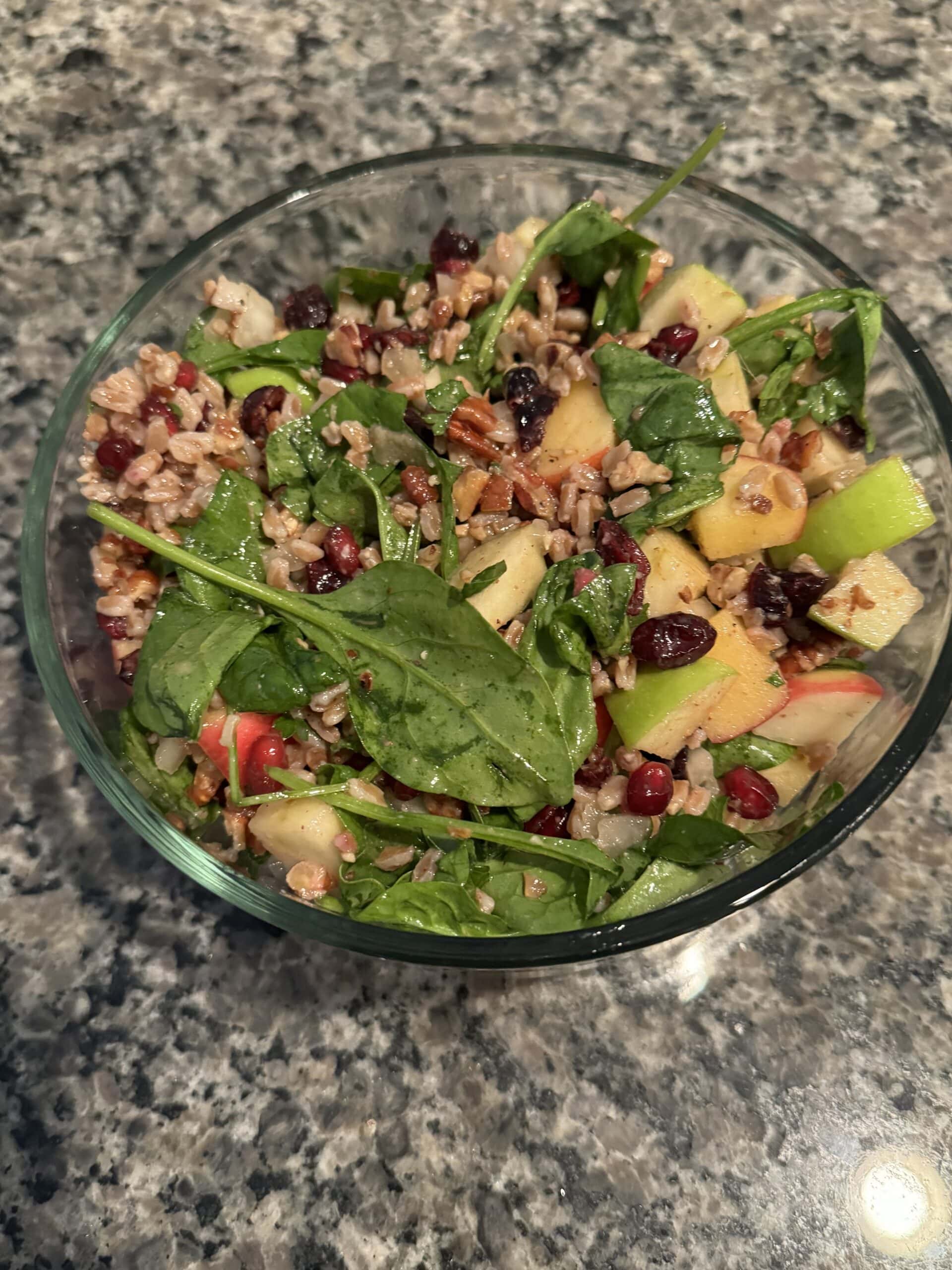 leftover farro winter salad in a glass dish