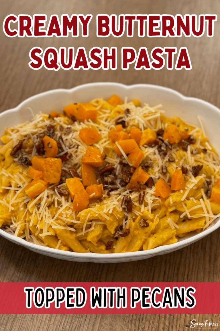 the finished fall pasta recipe with the text overlay Creamy Butternut Squash Pasta Topped with Pecans