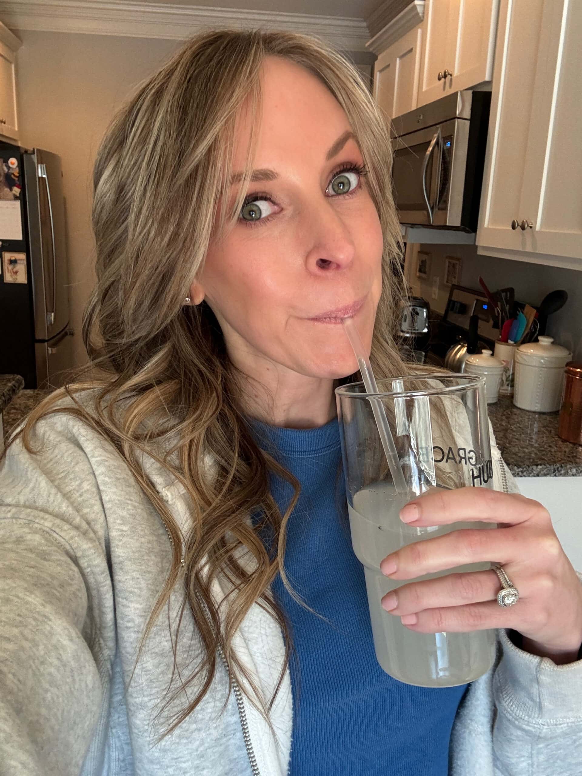 Kalee drinking Hydrate and detox