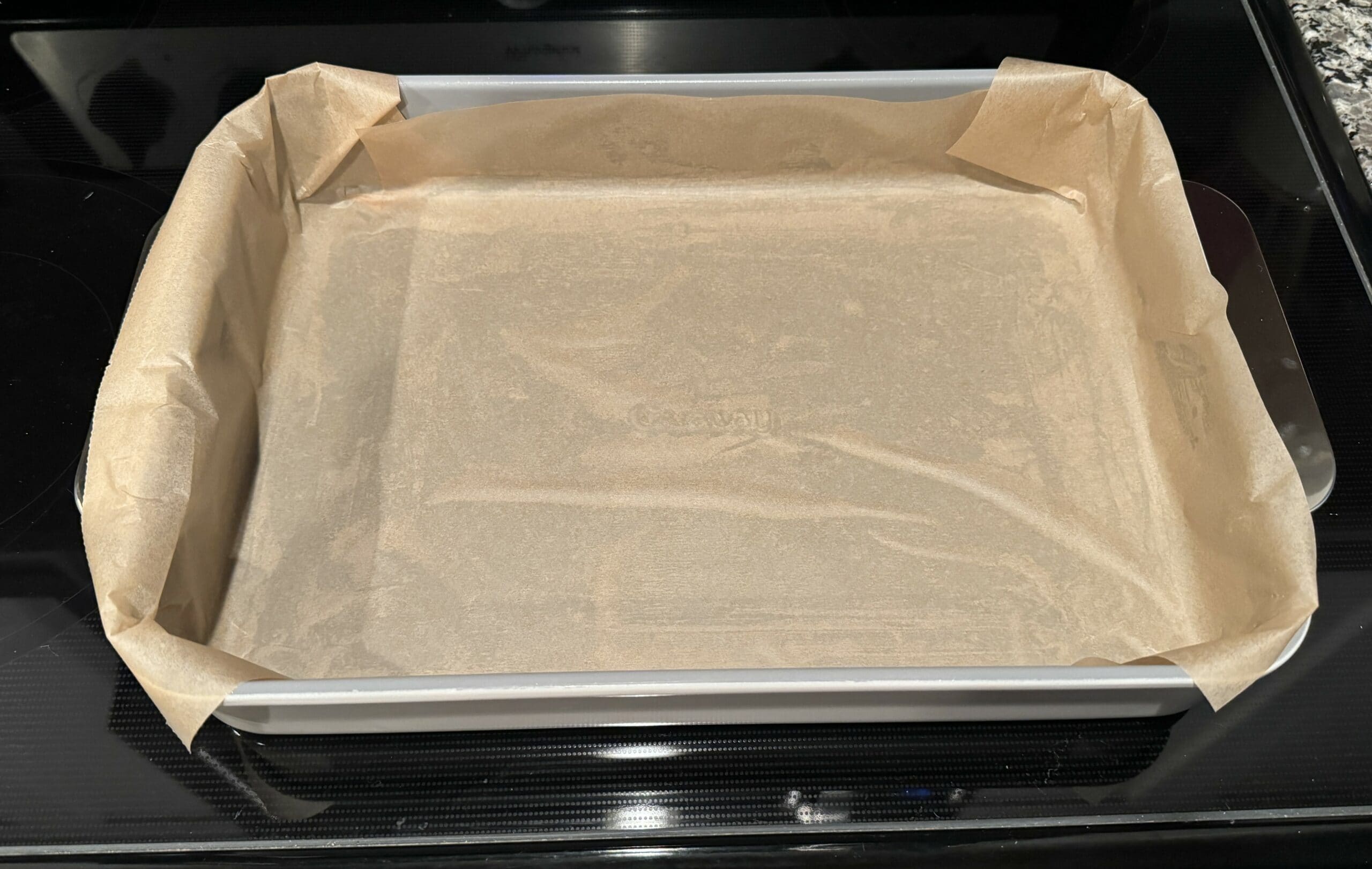 caraway rectangle pan lined with parchment paper
