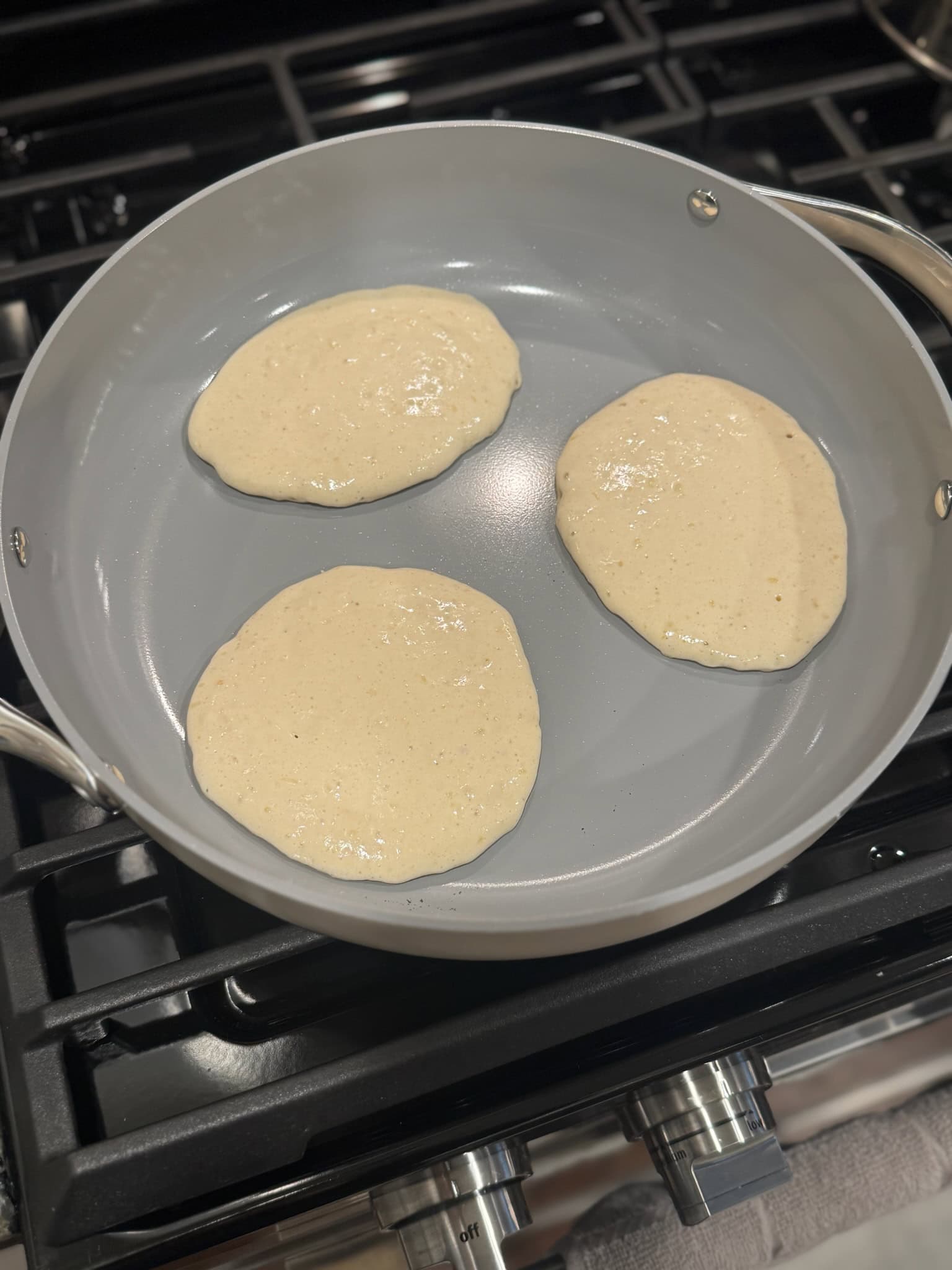 overhead shot of pancakes in caraway cooking skillet 1
