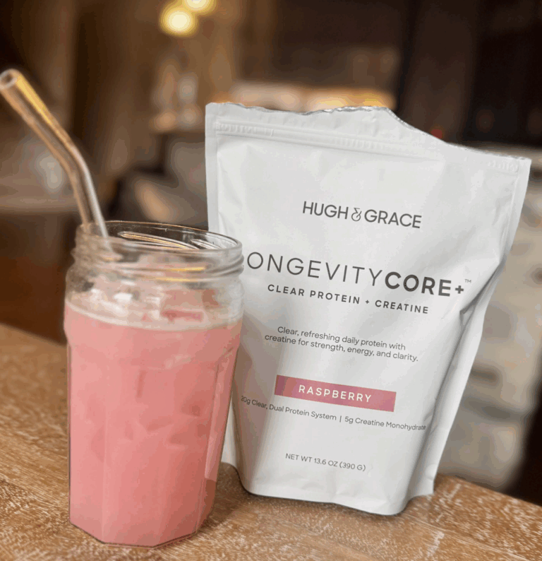 bag of hugh and grace longevity core and a glass with a straw with a serving of it